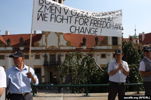 Uzbekistan is called out in the U.S. report, along with Iran, China, and Burma. Here, exiled opponents of Uzbek President Islam Karimov hold a demonstration in Prague on September 2.