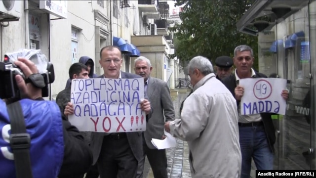 Azerbaijani opposition activists protested the amendments in Baku on November 2.