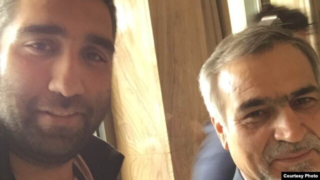 Iranian journalist Amir Hossein Motaqi (left), with Rohani's younger brother and adviser, Hossein Fereydoun 