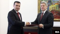 SDSM leader Zoran Zaev (left) meets with President Gjorge Ivanov on February 27.