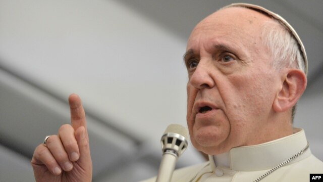 Pope Francis also says he envisions a greater role for women in the 1.2 billion-member church.