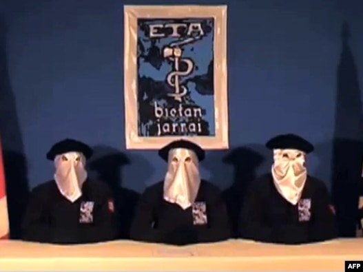 A screen grab shows ETA members declaring a ceasefire in the Basque town of Guernica late last year. 