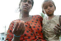 Burmese woman begging. RFA/Tyler Chapman