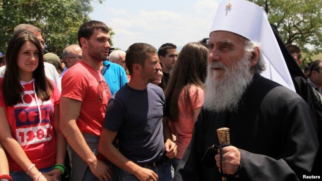 Patriarch Irinej (right) of Serbia seen here near the Kosovo capital, Pristina, in June