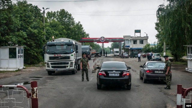 Russian soldiers man a border station near Benderi, in Moldova's breakaway Transdniaster, in this 2013 photograph.