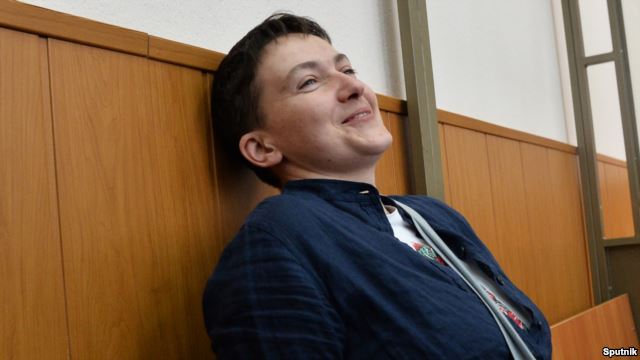 Ukrainian military pilot Nadia Savchenko reacts inside a defendant's cage during her sentencing hearing at a court in the southern Russian town of Donetsk on March 22.