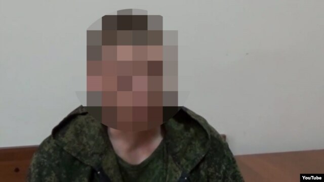 A screen grab of the video showing captured Russian soldier Major Vladimir Starkov.