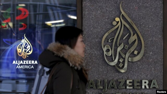 Al-Jazeera's logo at its broadcast center in midtown Manhattan in New York City