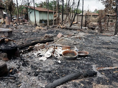 Broken dishes are among the remains of a house in Myo Thu Gyi Muslim village where homes were burned to the ground near Maungdaw township in Myanmar's northern Rakhine state, Aug. 31, 2017.