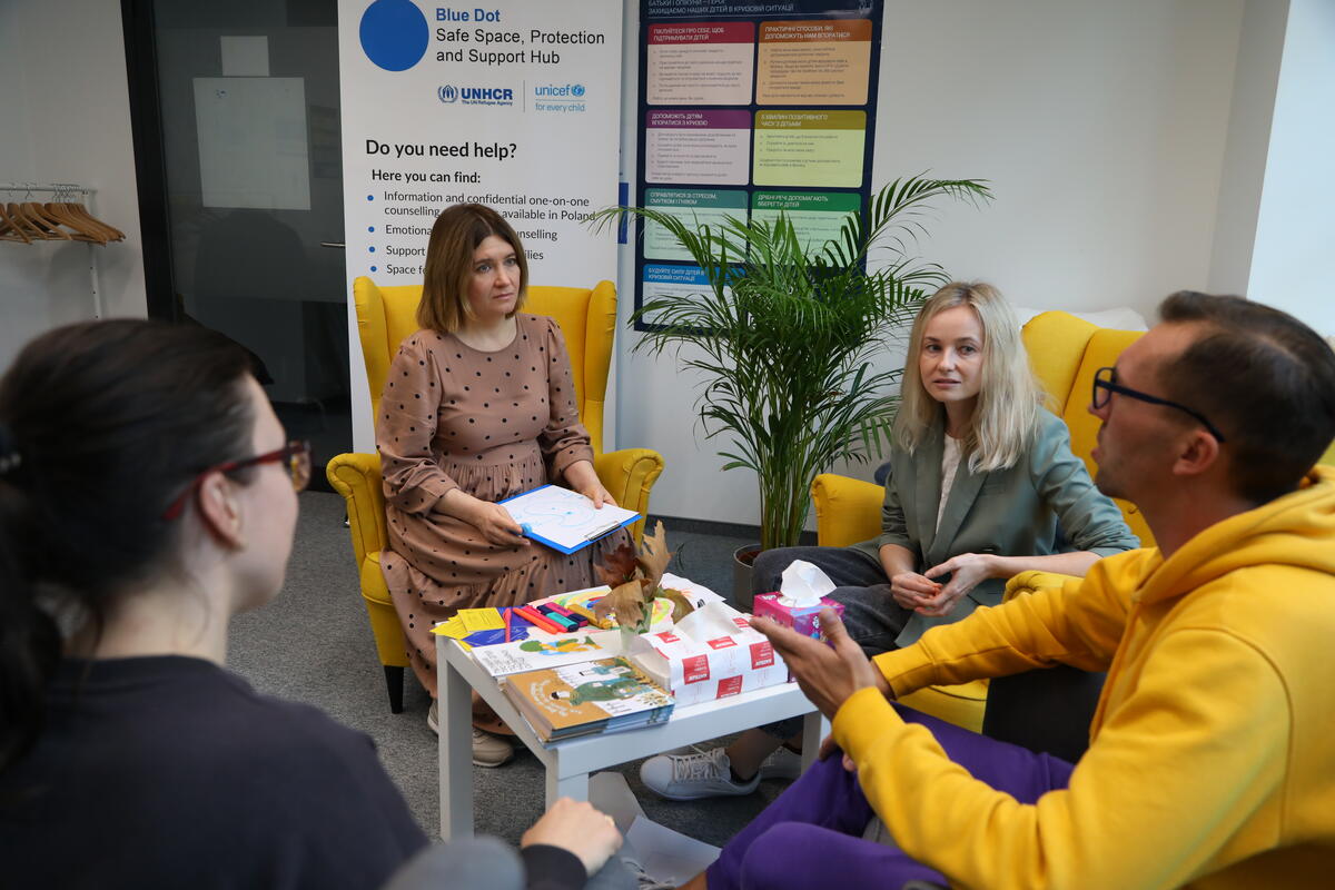 Poland. refugees from Ukraine getting psychological assistance at a UNHCR/Unicef Blue Dot in Warsaw