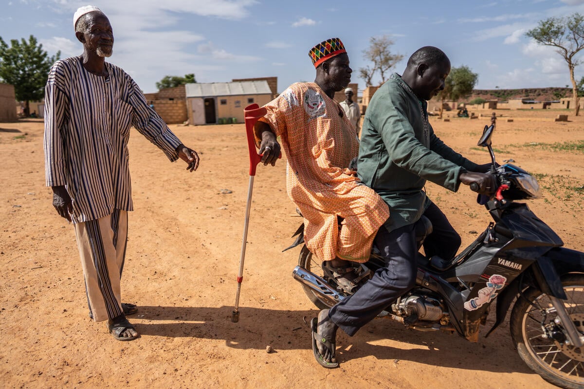 Burkina Faso. Chief Diambende visits displaced man he helped to shelter