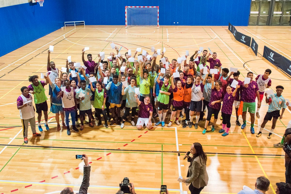 Switzerland. Mixed teams size each other up for indoor football tournament