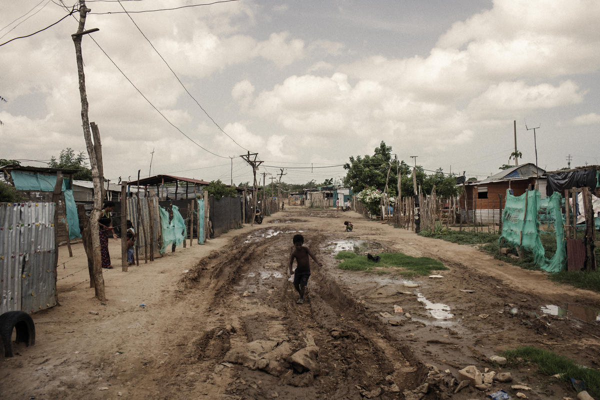 A boy at play in a neighbourhood in eastern Colombia that is home to thousands of Venezuelan refugees and migrants.