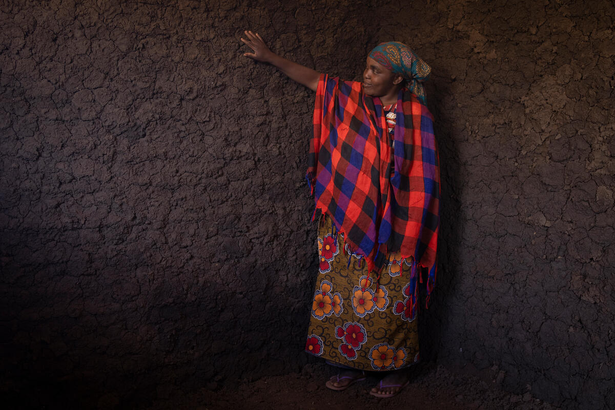 Mozambique. Displaced woman in new home in Corrane site