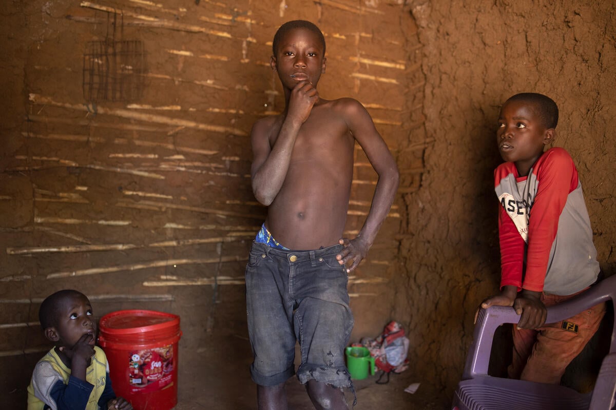 Mozambique. Refugee children in their temporary shelter